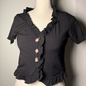 Cider Black Ruffled V-Neck Blouse with Pink Floral Buttons
